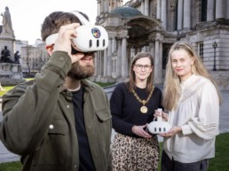Innovators using virtual headsets with High Sheriff outside Belfast City Hall